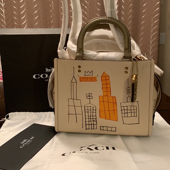 SOLD! COACH Leather X Jean-Michel Basquiat
Rogue 25 in Brass/lvory. - Picture 2 of 7